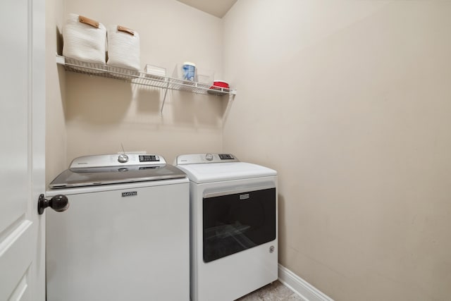 112 Woods Point Cir, Georgetown, KY 40324 - washroom featuring washing machine and dryer and baseboards