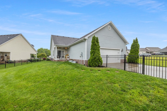 112 Woods Point Cir, Georgetown, KY 40324 - back of house featuring an attached garage, concrete driveway, and a shingled roof