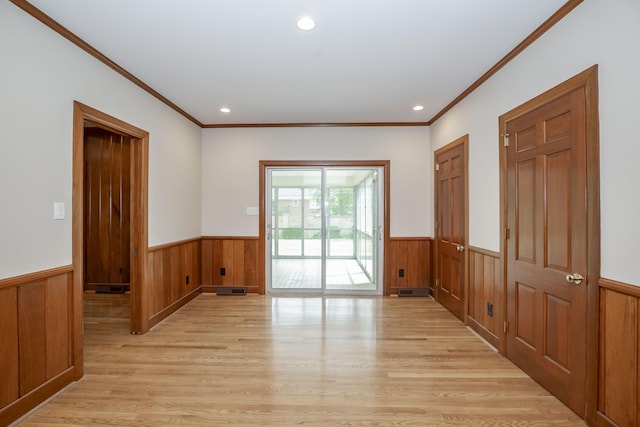 804 Old Dobbin Rd, Lexington, KY 40502 - unfurnished room featuring wainscoting, light wood-style flooring, ornamental molding, wood walls, and recessed lighting