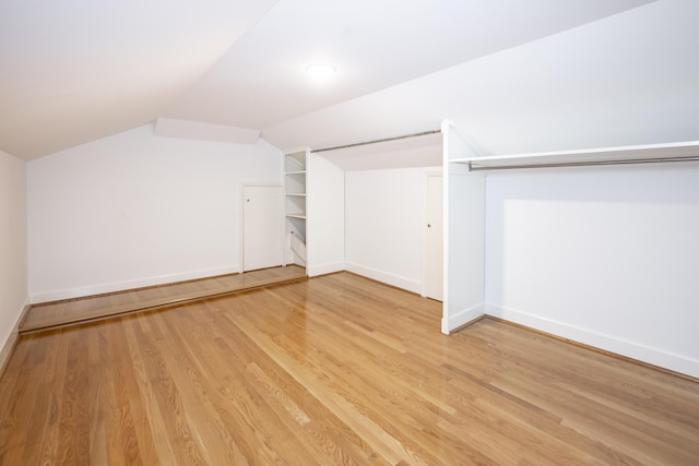 804 Old Dobbin Rd, Lexington, KY 40502 - walk in closet with lofted ceiling and light wood-style flooring