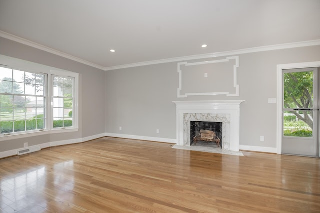 804 Old Dobbin Rd, Lexington, KY 40502 - unfurnished living room featuring plenty of natural light, a premium fireplace, ornamental molding, light wood finished floors, and baseboards
