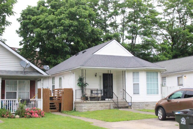 1017 Marshall Park Dr, Georgetown, KY 40324 - view of front of property featuring covered porch, a front yard, and a shingled roof