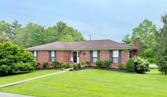 100 Cave Run Rd, Frankfort, KY 40601 - ranch-style home featuring a chimney, a front yard, and brick siding