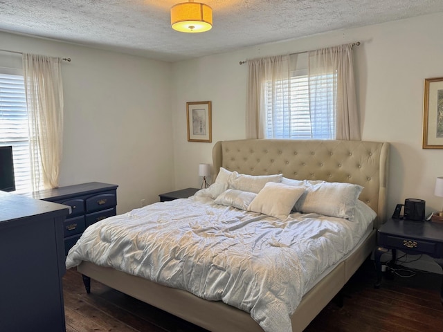 100 Cave Run Rd, Frankfort, KY 40601 - bedroom with a textured ceiling and dark wood-type flooring