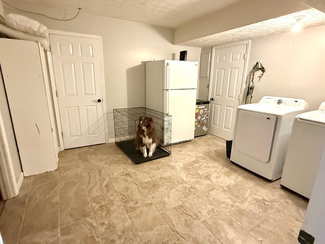 100 Cave Run Rd, Frankfort, KY 40601 - laundry room with separate washer and dryer and a textured ceiling