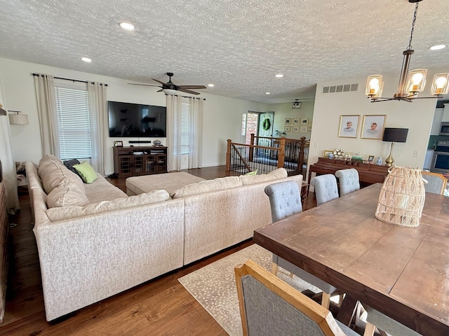100 Cave Run Rd, Frankfort, KY 40601 - living area featuring a chandelier, wood finished floors, a textured ceiling, recessed lighting, and ceiling fan