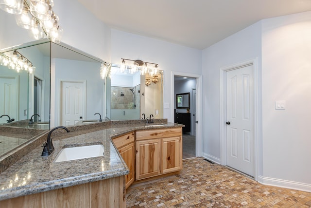 209 Juniper Dr, Nicholasville, KY 40356 - bathroom with a shower stall, double vanity, tile patterned floors, and baseboards
