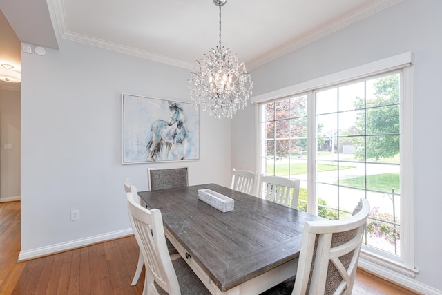 209 Juniper Dr, Nicholasville, KY 40356 - dining room featuring hardwood / wood-style floors, healthy amount of natural light, baseboards, and ornamental molding