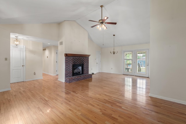 113 Alta Dr, Lawrenceburg, KY 40342 - unfurnished living room featuring a chandelier, high vaulted ceiling, a brick fireplace, a ceiling fan, and light wood finished floors