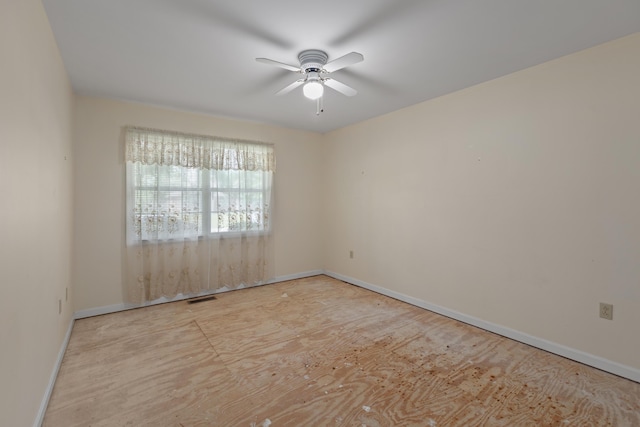 113 Alta Dr, Lawrenceburg, KY 40342 - spare room featuring a ceiling fan and baseboards