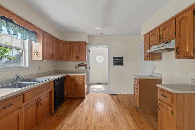 113 Alta Dr, Lawrenceburg, KY 40342 - kitchen with under cabinet range hood, black dishwasher, a sink, and brown cabinets