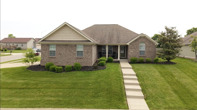 101 Dorset Ln, Winchester, KY 40391 - ranch-style home featuring a front yard, brick siding, and a shingled roof
