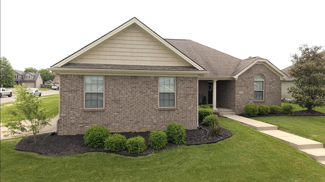 101 Dorset Ln, Winchester, KY 40391 - ranch-style house featuring a front lawn, brick siding, and roof with shingles