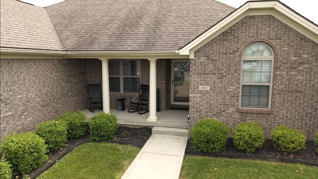 101 Dorset Ln, Winchester, KY 40391 - entrance to property featuring covered porch, brick siding, and a shingled roof