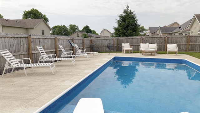 101 Dorset Ln, Winchester, KY 40391 - view of pool with a patio, a fenced backyard, and a diving board
