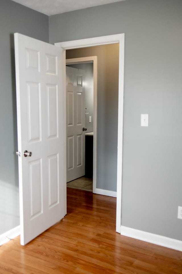 144 Williamsburg Ln, Georgetown, KY 40324 - corridor with light wood-type flooring and baseboards