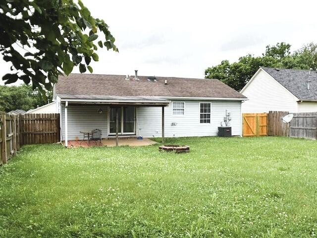 144 Williamsburg Ln, Georgetown, KY 40324 - rear view of property with a patio