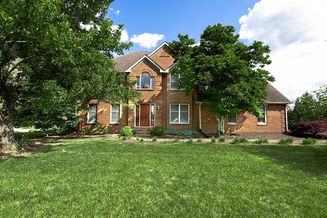 6011 Canonero Way, Versailles, KY 40383 - colonial house with brick siding, a front lawn, and roof with shingles