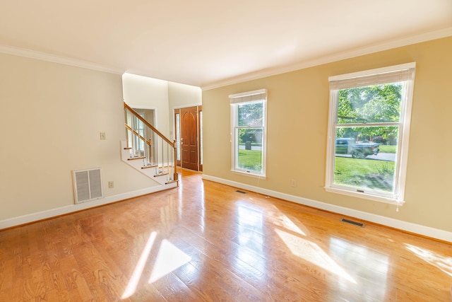 6011 Canonero Way, Versailles, KY 40383 - empty room featuring baseboards, crown molding, stairs, and wood finished floors