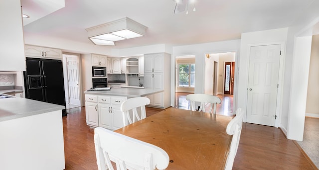 6011 Canonero Way, Versailles, KY 40383 - dining area featuring light wood-style flooring and baseboards