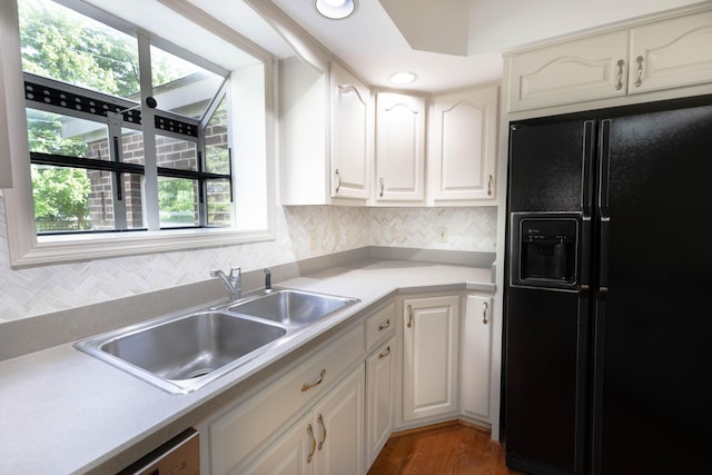 6011 Canonero Way, Versailles, KY 40383 - kitchen featuring black fridge, a sink, decorative backsplash, light countertops, and recessed lighting