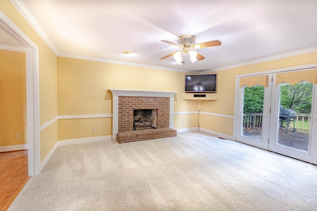 6011 Canonero Way, Versailles, KY 40383 - unfurnished living room featuring ornamental molding, a ceiling fan, carpet flooring, baseboards, and a brick fireplace