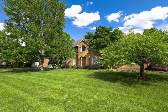6011 Canonero Way, Versailles, KY 40383 - view of front of house with a front yard and brick siding