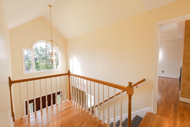 6011 Canonero Way, Versailles, KY 40383 - stairs with vaulted ceiling, wood finished floors, a chandelier, and baseboards