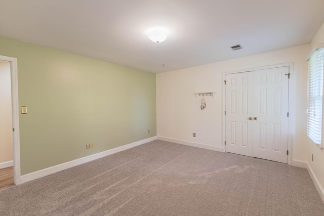 6011 Canonero Way, Versailles, KY 40383 - unfurnished bedroom with carpet floors, baseboards, and a closet