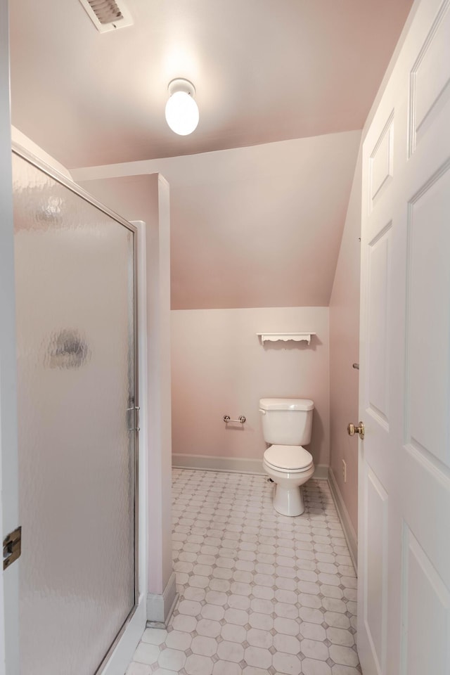6011 Canonero Way, Versailles, KY 40383 - full bath with toilet, a stall shower, vaulted ceiling, and baseboards
