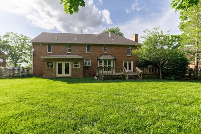 6011 Canonero Way, Versailles, KY 40383 - rear view of house with french doors, a chimney, a wooden deck, and brick siding
