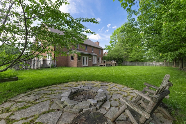 6011 Canonero Way, Versailles, KY 40383 - view of yard featuring a wooden deck and a fire pit
