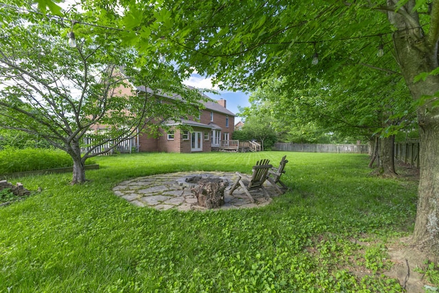 6011 Canonero Way, Versailles, KY 40383 - view of yard with a deck and a fire pit