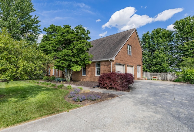 6011 Canonero Way, Versailles, KY 40383 - view of front of home featuring brick siding, concrete driveway, an attached garage, and a shingled roof