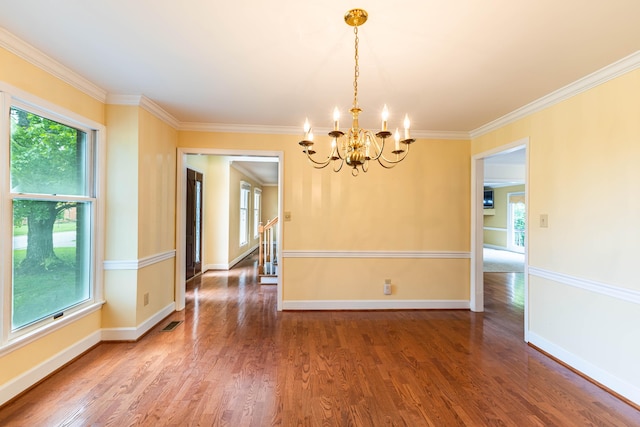 6011 Canonero Way, Versailles, KY 40383 - unfurnished dining area with a chandelier, plenty of natural light, crown molding, wood finished floors, and baseboards
