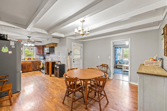 1023 Chickasaw Trl, Frankfort, KY 40601 - dining space featuring light wood-style floors, ceiling fan, beamed ceiling, a chandelier, and baseboards