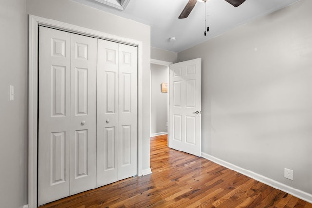 2849 Walnut Hill Rd, Lexington, KY 40515 - unfurnished bedroom with wood finished floors, baseboards, a closet, and ceiling fan