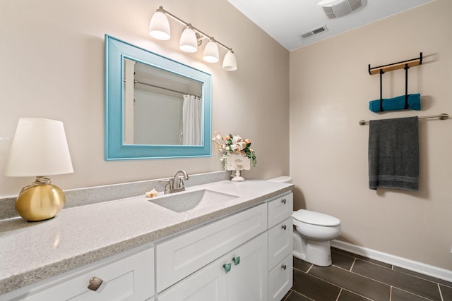 2849 Walnut Hill Rd, Lexington, KY 40515 - full bathroom with toilet, vanity, baseboards, tile patterned floors, and a shower with shower curtain