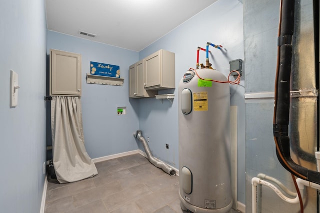 2849 Walnut Hill Rd, Lexington, KY 40515 - utility room featuring electric water heater