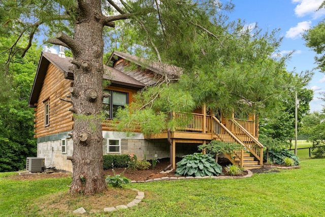 2849 Walnut Hill Rd, Lexington, KY 40515 - back of property with central AC unit, a lawn, stairway, log exterior, and a deck