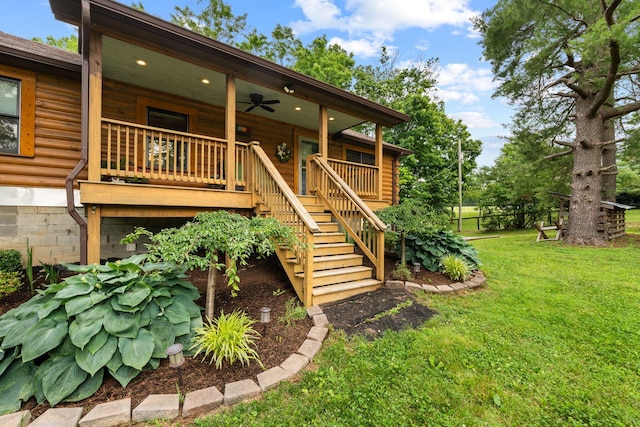 2849 Walnut Hill Rd, Lexington, KY 40515 - back of property with stairs, a lawn, a ceiling fan, and a porch