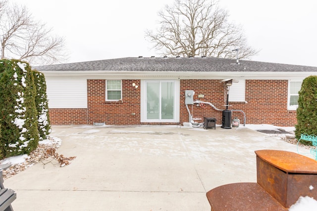 9412 Harrodsburg Rd, Wilmore, KY 40390 - back of house featuring brick siding and a patio