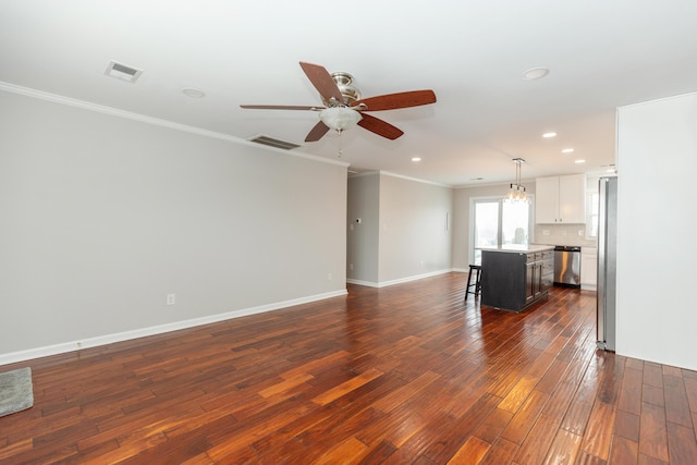 9412 Harrodsburg Rd, Wilmore, KY 40390 - unfurnished living room with ornamental molding, dark wood-style flooring, a ceiling fan, recessed lighting, and baseboards