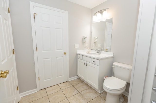 9412 Harrodsburg Rd, Wilmore, KY 40390 - bathroom with vanity, toilet, tile patterned floors, and baseboards
