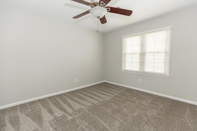 9412 Harrodsburg Rd, Wilmore, KY 40390 - empty room featuring carpet, baseboards, and ceiling fan