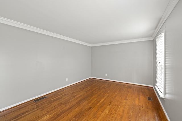 2152 Sallee Dr, Lexington, KY 40513 - spare room featuring crown molding, baseboards, and wood finished floors