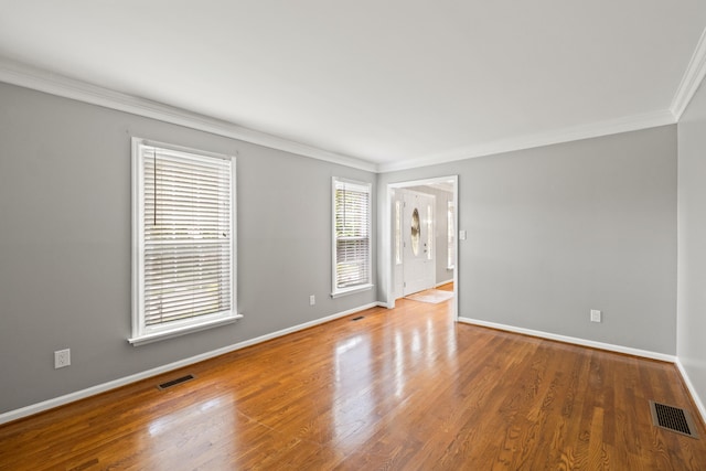 2152 Sallee Dr, Lexington, KY 40513 - spare room featuring crown molding, baseboards, and wood finished floors