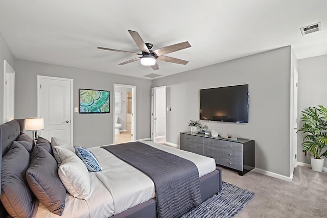2152 Sallee Dr, Lexington, KY 40513 - bedroom with baseboards, light carpet, connected bathroom, and a ceiling fan