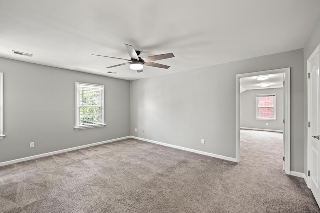 2152 Sallee Dr, Lexington, KY 40513 - unfurnished room with a ceiling fan, carpet, and healthy amount of natural light