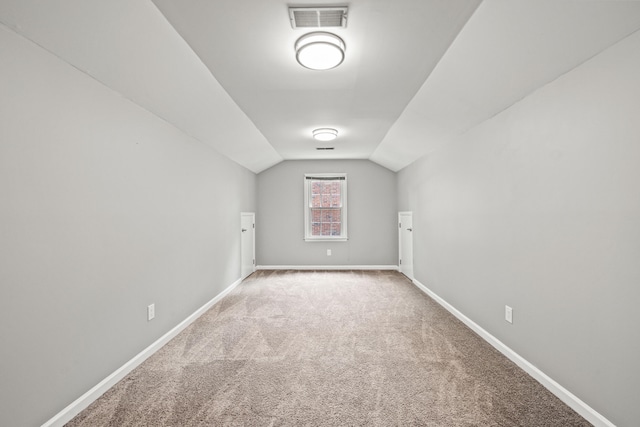 2152 Sallee Dr, Lexington, KY 40513 - additional living space featuring carpet flooring, vaulted ceiling, and baseboards